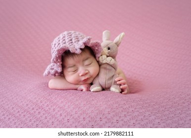 Smiling Newborn Baby With Mohawk Hair Sleeping