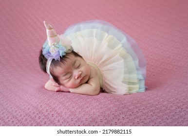 Smiling Newborn Baby With Mohawk Hair Sleeping