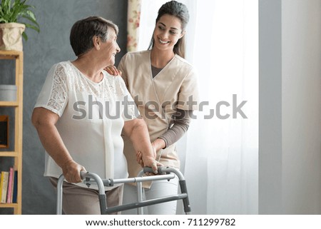 Similar – Image, Stock Photo Woman with walker