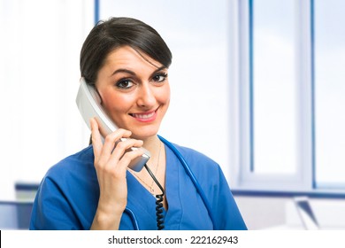 Smiling Nurse Talking On The Phone