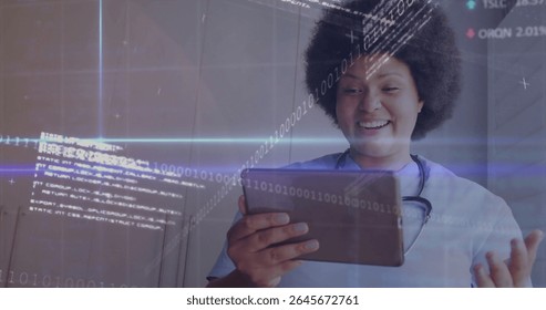Smiling nurse wearing scrubs using tablet in clinic hallway, with stethoscope, data, copy space. Medical, healthcare, technology, telemedicine, digital, hospital, professional