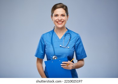 Smiling Nurse Woman Holding Clipboard. Isolated Portrait.