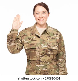 Smiling At Oath Of Enlistment. Attractive Female Army Soldier Wearing Multicam Camouflage.