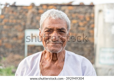 Smiling old man closeup in rural village Salunkwadi, Ambajogai, Beed, Maharashtra, India, Southeast Asia