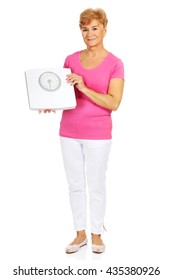 Smiling Old Woman Holding Weight Scale