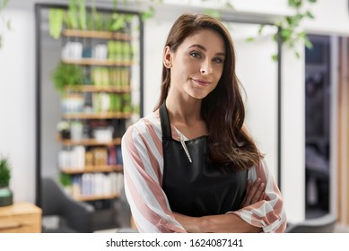 Smiling Owner Of Hairdresser Salon