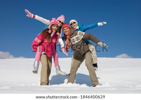 Similar – Image, Stock Photo Sisters enjoying piggyback ride