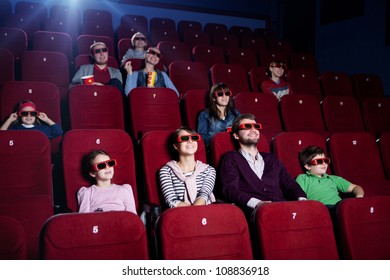 Smiling People In 3D Movie Theater