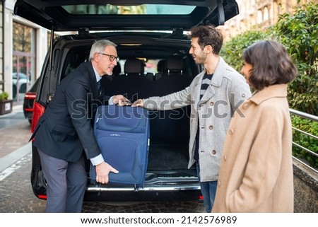 Smiling people using a shuttle transfer service