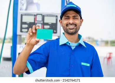 Smiling Petrol Pump Worker Showing Green Screen Empty Card By Looking Camera At Fuel Station - Concept Of Employee Id Card, Ad Promotion And Job