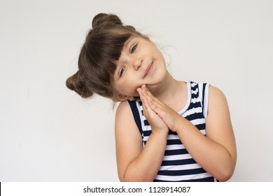 Smiling pleased pretty kid. - Shutterstock ID 1128914087