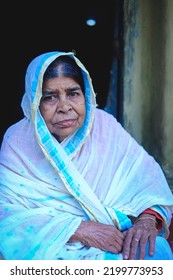 Smiling Portrait Of South Asian Aged Grandmother,close Up Headshot Of Bangladeshi Elderly Woman, Senior Widow In Traditional Costumes