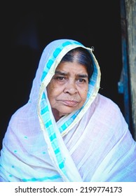 Smiling Portrait Of South Asian Aged Grandmother,close Up Headshot Of Bangladeshi Elderly Woman, Senior Widow In Traditional Costumes