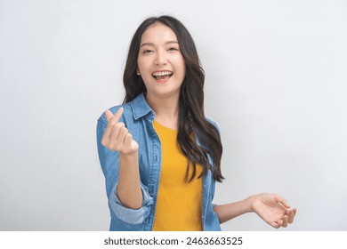 Smiling positive, attractive asian young woman finger showing mini heart sign, portrait of beautiful brunette hair with long hair. Cheerful, expression face happy standing isolated on white background - Powered by Shutterstock