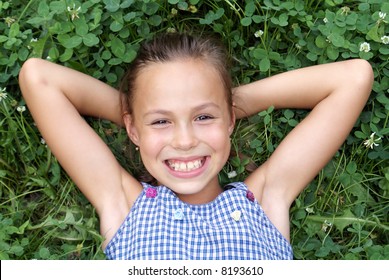 Smiling Preteen Girl On Clover Background????8193610 Shutterstock photo