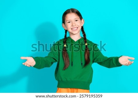 Similar – Image, Stock Photo Preteen girl in hoodie standing near green trees