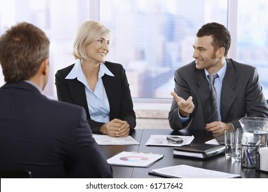 Happy Young Business People Sitting Around Stock Photo 40946134 ...