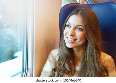 Smiling Relaxed Woman Travel With Train With Flare