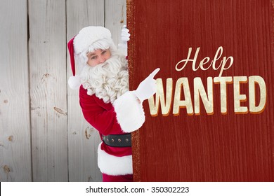 Smiling Santa Claus Pointing Poster Against Vintage Help Wanted Sign