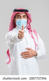 Smiling Saudi Young Man Wearing A Mask