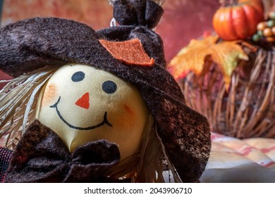 A Smiling Scaregrow Photobombs A Thanksgiving Spread.