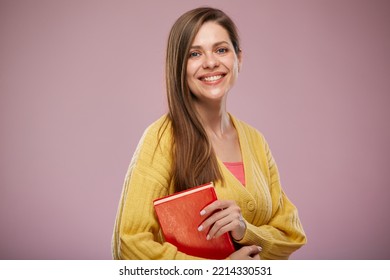 Smiling School Teacher Holding Book. Isolated Advertising Portrait On Pink Back.