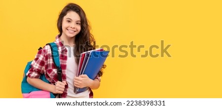smiling school teen girl ready to study with backpack and notebooks. Portrait of schoolgirl student, studio banner header. School child face, copyspace.