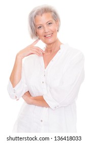 Smiling Senior Woman In Front Of White Background