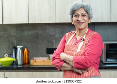 Smiling Senior Woman In Kitchen