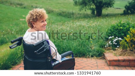 Similar – Senior woman in wheelchair