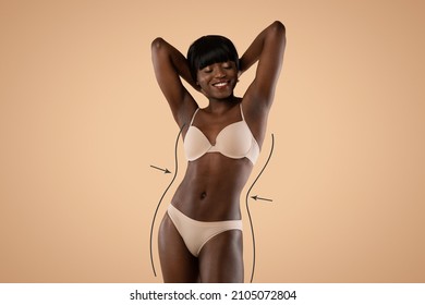 Smiling sexy young black model in beige underwear demonstrating her young slender body, black curvy lines with arrows showing perfect shapes, beige studio background, copy space, cropped, collage