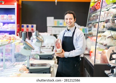 Smiling shopkeeper - Powered by Shutterstock