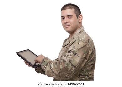 Smiling Soldier Working On A Digital Tablet