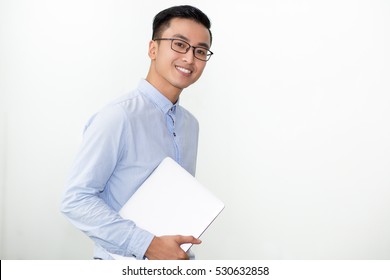 Smiling Student In Glasses Carrying Laptop