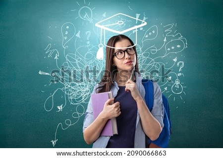 Smiling student pondering about educational prospective in future career, master degree programs