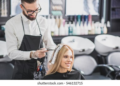 Smiling Stylist Is Dying Long Hair