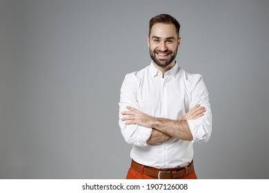 Smiling Successful Confident Young Bearded Business Man 20s Wearing Classic White Shirt Holding Hands Crossed Isolated On Grey Color Background Studio Portrait. Achievement Career Wealth Concept