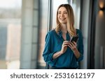 Smiling successful female professional executive hr manager using computer in corporate office