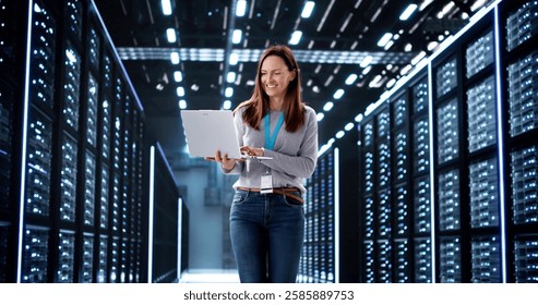 Smiling tech expert setting up artificial intelligence in data center.