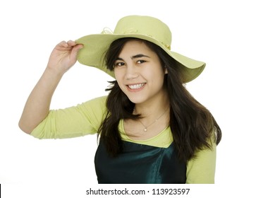 Smiling Teen  Biracial Girl In Green Dress And Lime Green Hat