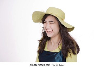 Smiling Teen  Biracial Girl In Green Dress And Lime Green Hat