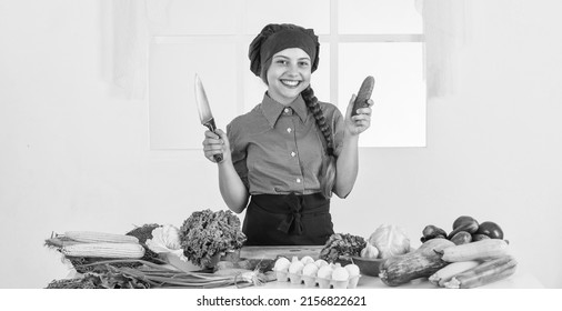 Smiling Teen Girl In Chef Uniform Cooking Vegetables, Vitamin