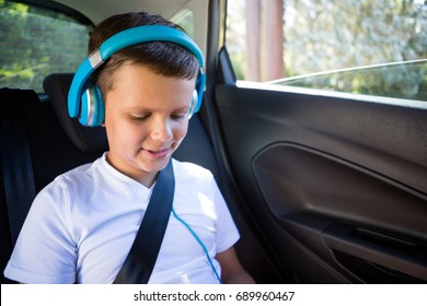 Smiling Teenage Boy Headphones Sitting Back Stock Photo 689960467 ...