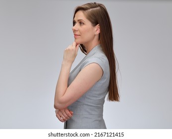 Smiling Thinking Business Woman Looking Away And Touching Her Chin, Profile View Isolated Portrait.