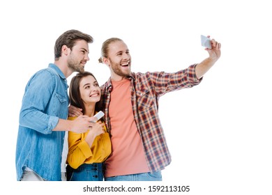 Smiling Three Young Friends Taking Selfie On Smartphone Isolated On White