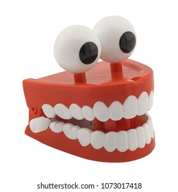 Smiling toy isolated on white background. Jaws or teeth toy