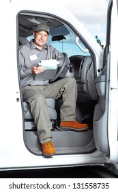 Smiling Truck Driver In The Car. Delivery Cargo Service.