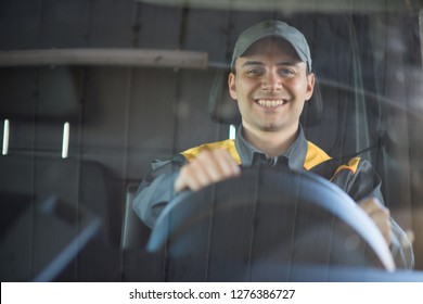 Smiling Van Or Truck Driver On The Road