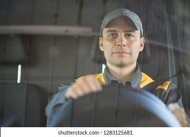 Smiling Van Or Truck Driver On The Road