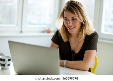 Smiling woman - Shutterstock ID 568399378